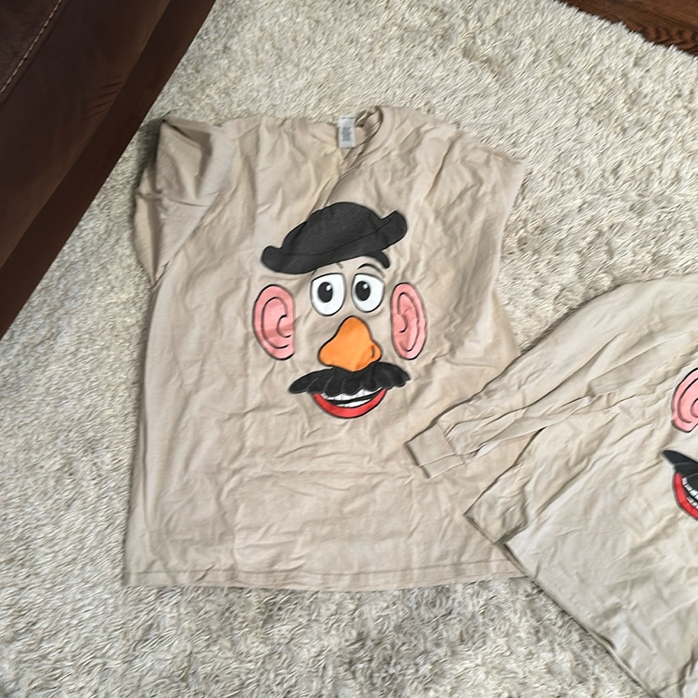 Three potato head shirts, one XL and two smalls